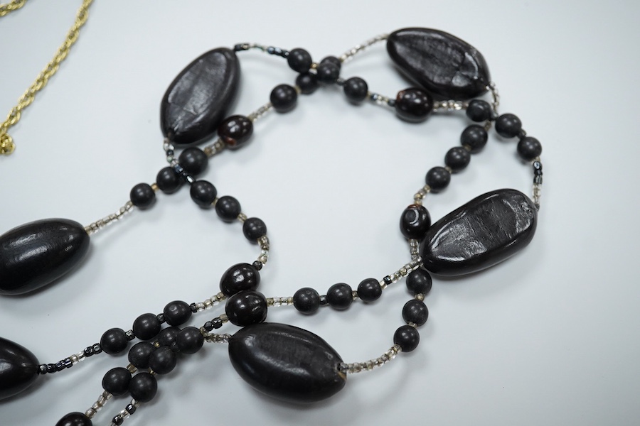 Two coral necklaces and a group of costume jewels, comprising: two coral bead necklaces, each with a gold clasp, combined gross weight approximately 35 grams; together with a simulant pearl necklace and pair of earrings